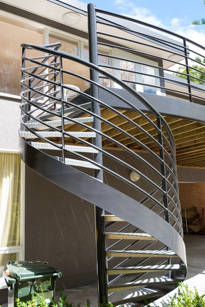 Metal stair case painted with dark gray